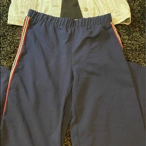 Blue pans with red lines on the sides.